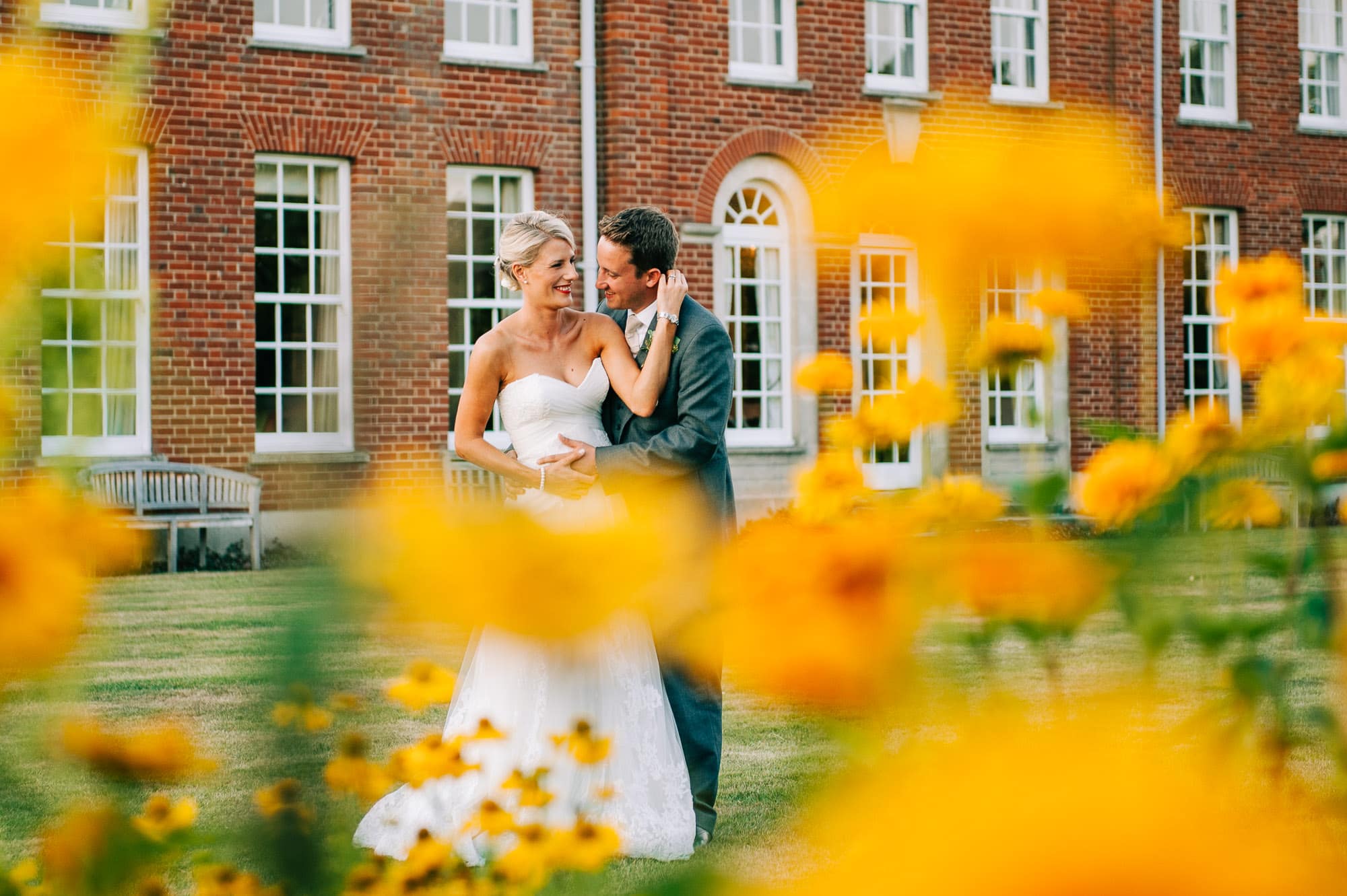 Bride and groom outside Hockering Hosue