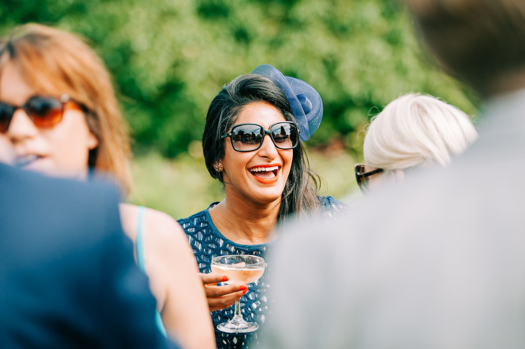 Wedding guests laughing at Hockering House