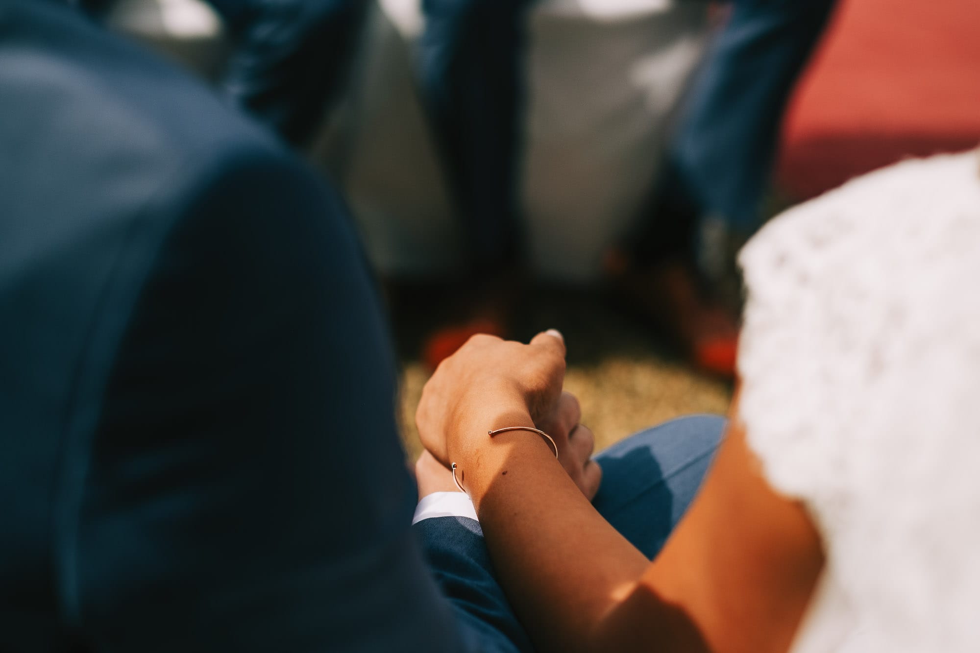Bride and groom holding hands