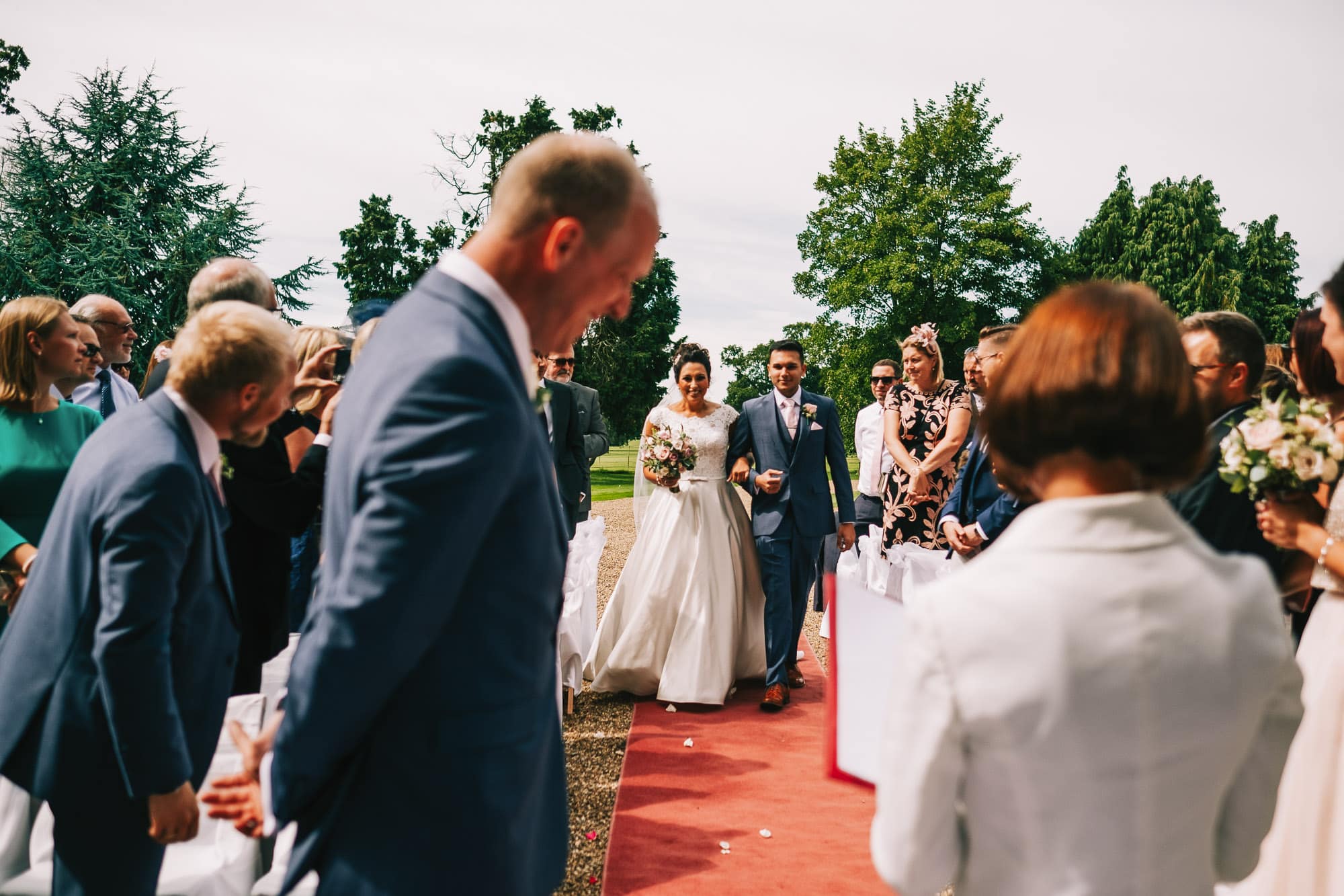 Bride and her son walk up the aisle