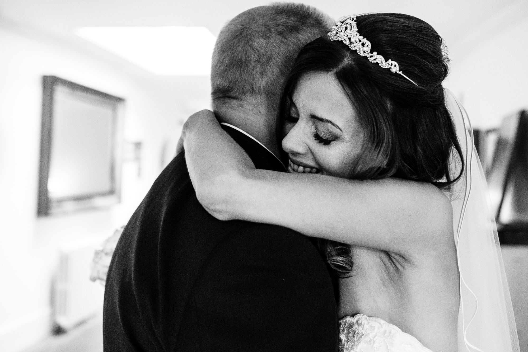 Bride hugging her dad
