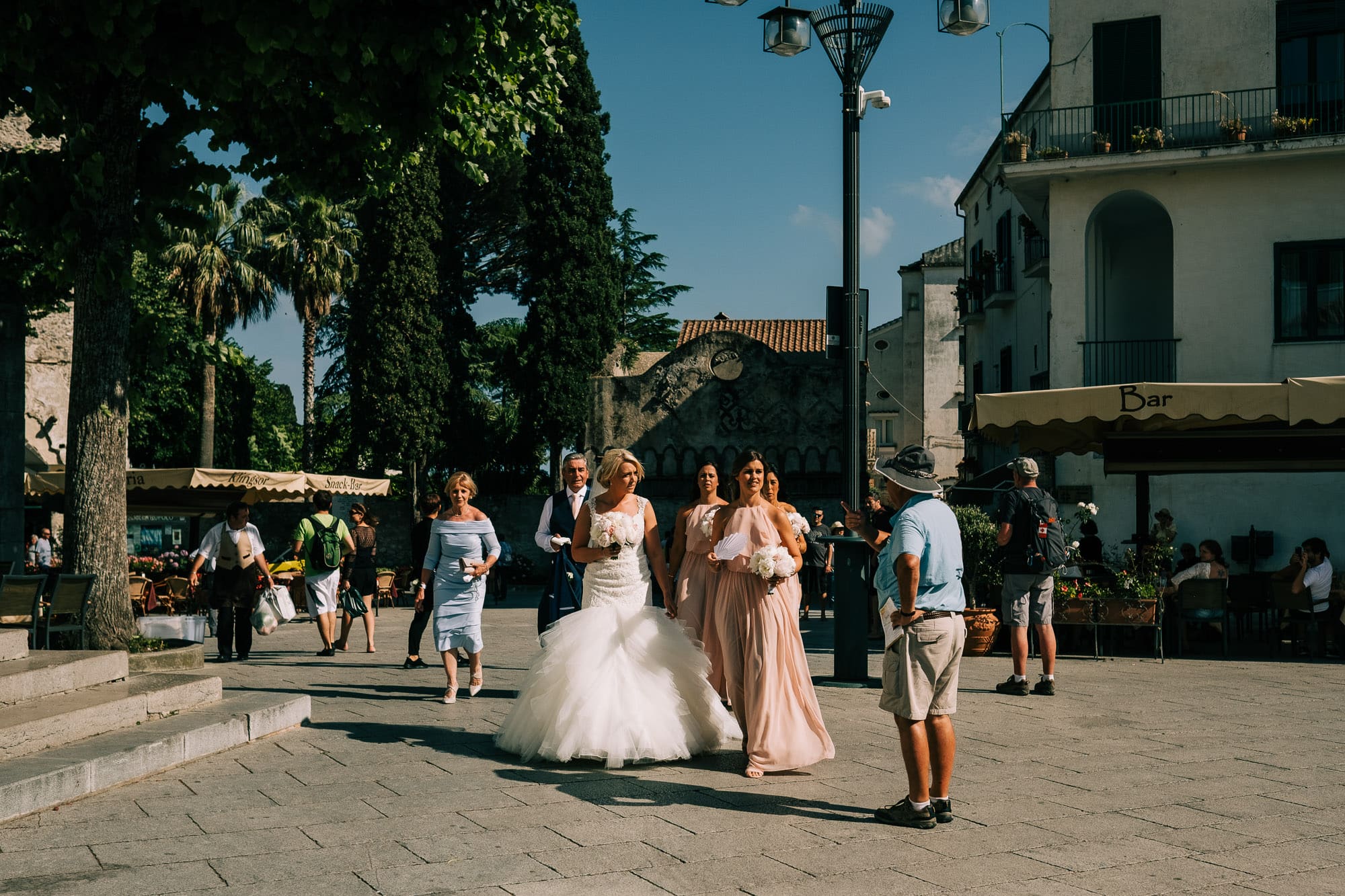 A tourist speaks to the bride