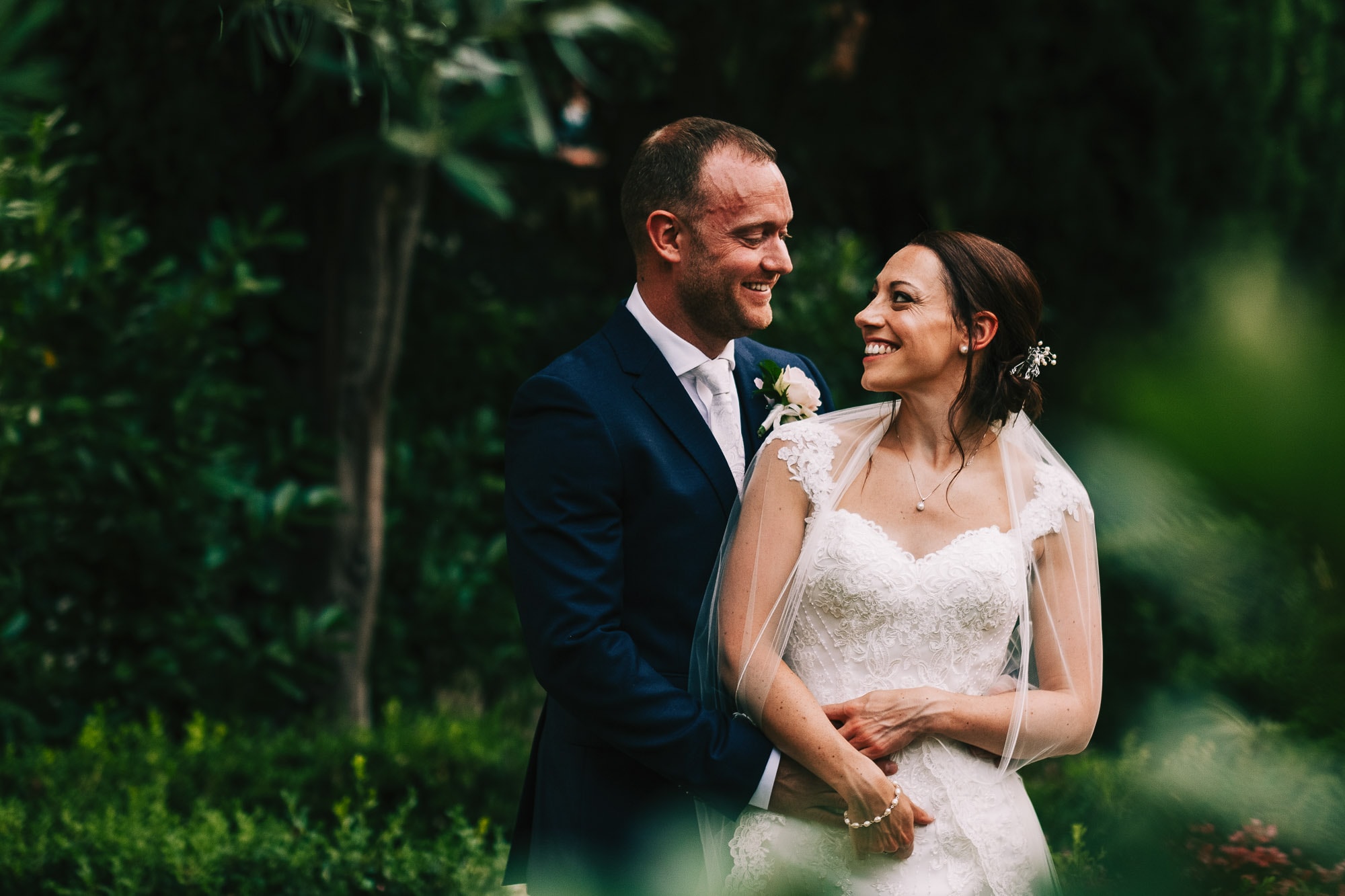 Bride and groom looking at each other in Villa Eva