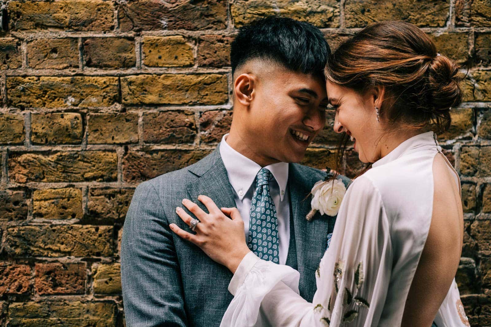 Bride and groom having a cuddle