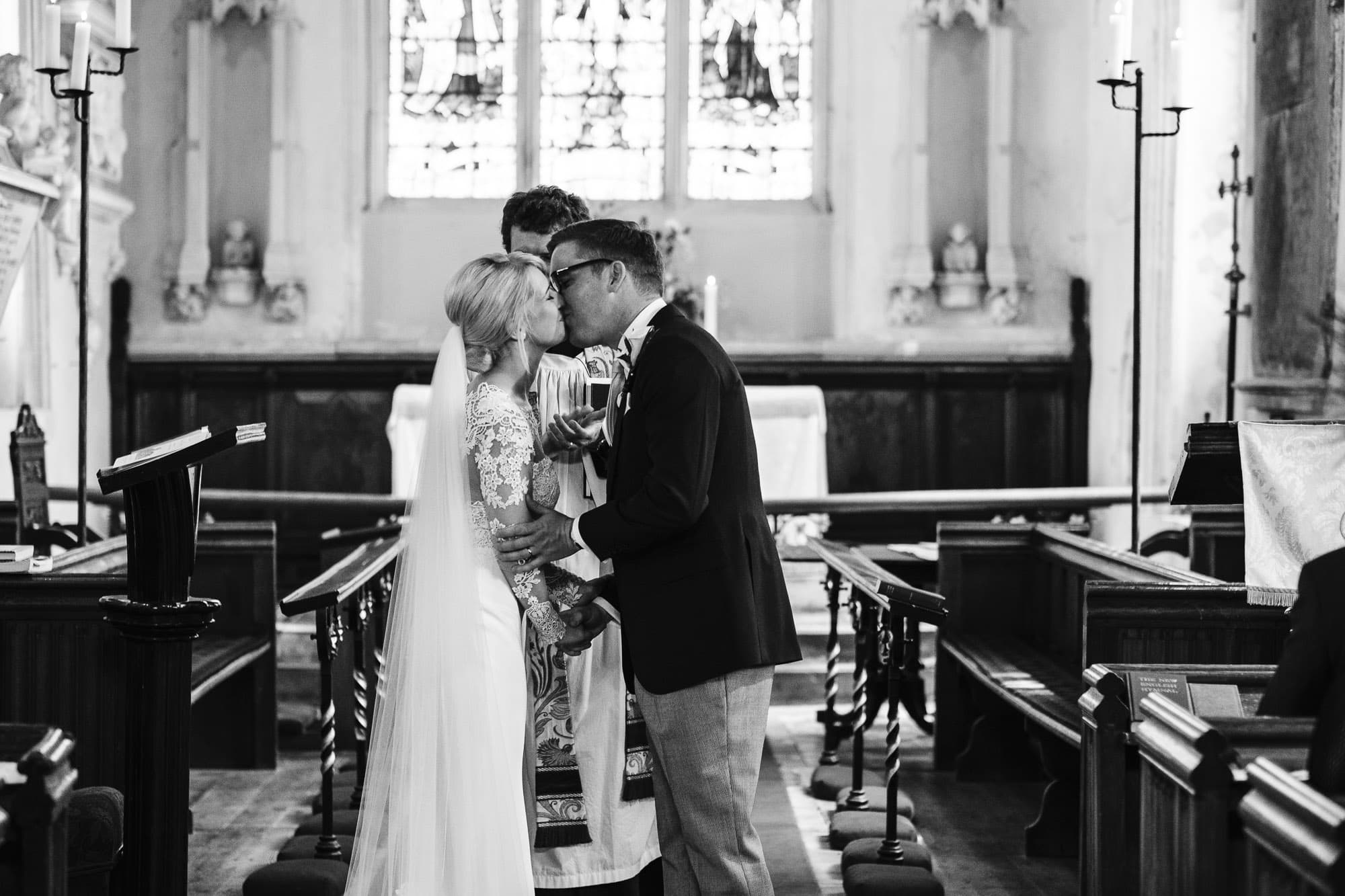 Bride and groom kiss at the end of the ceremony