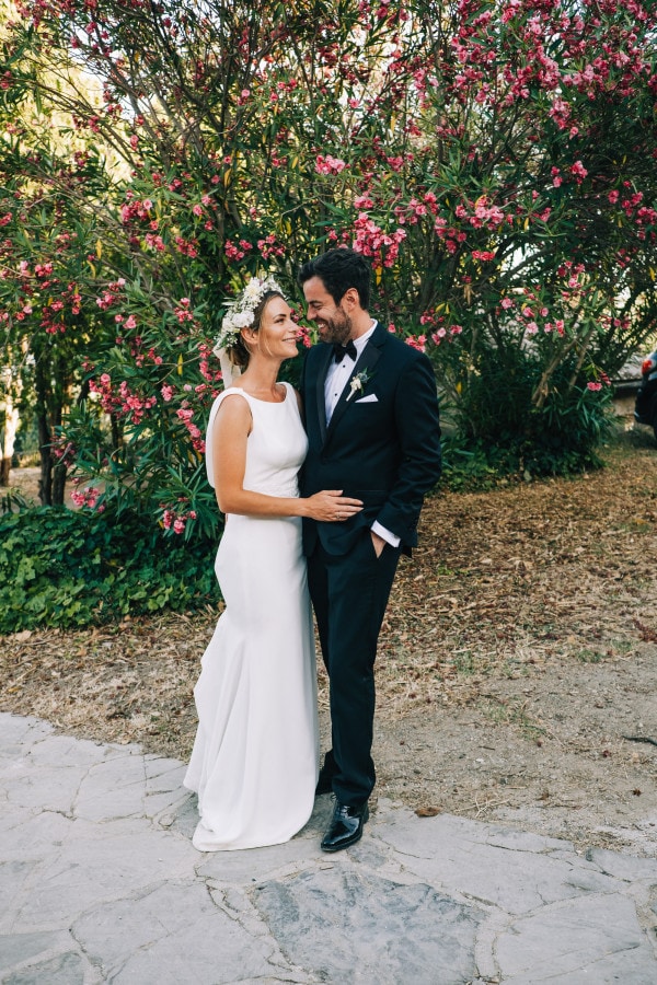 Bride and groom look at each other outside Agriturismo La Dogana