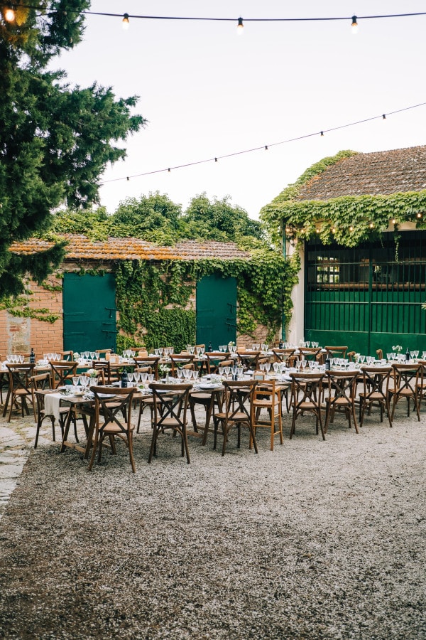 Stunning table setup outside the barn at Agriturismo La Dogana