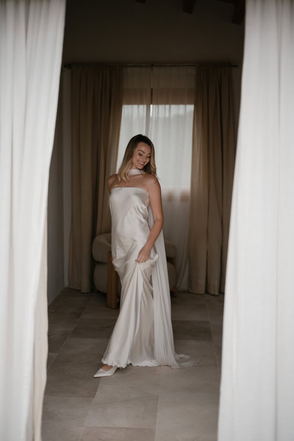 Bride looking down posing for photos at Fontsanta Hotel