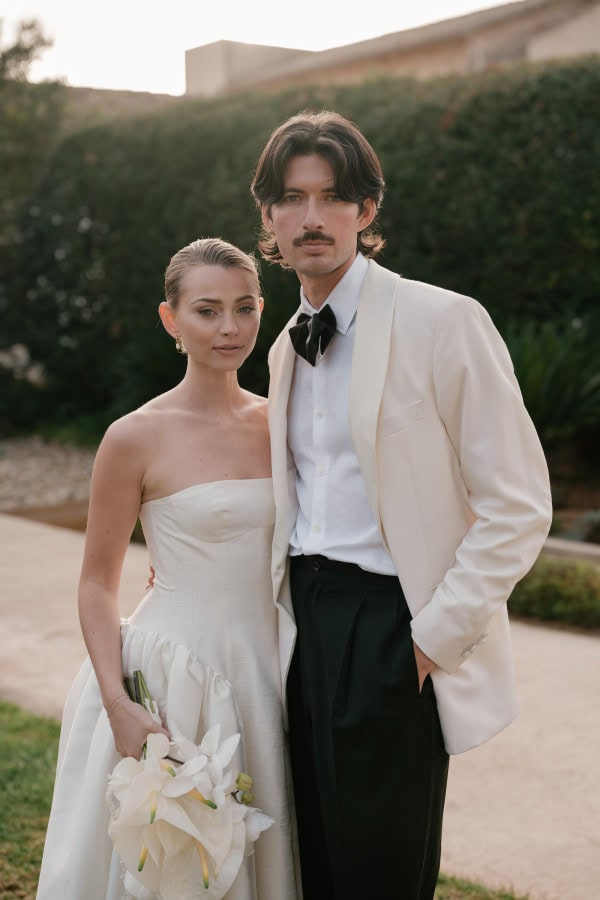 Bride and groom at sunset in the gardens at Fontsanta Hotel