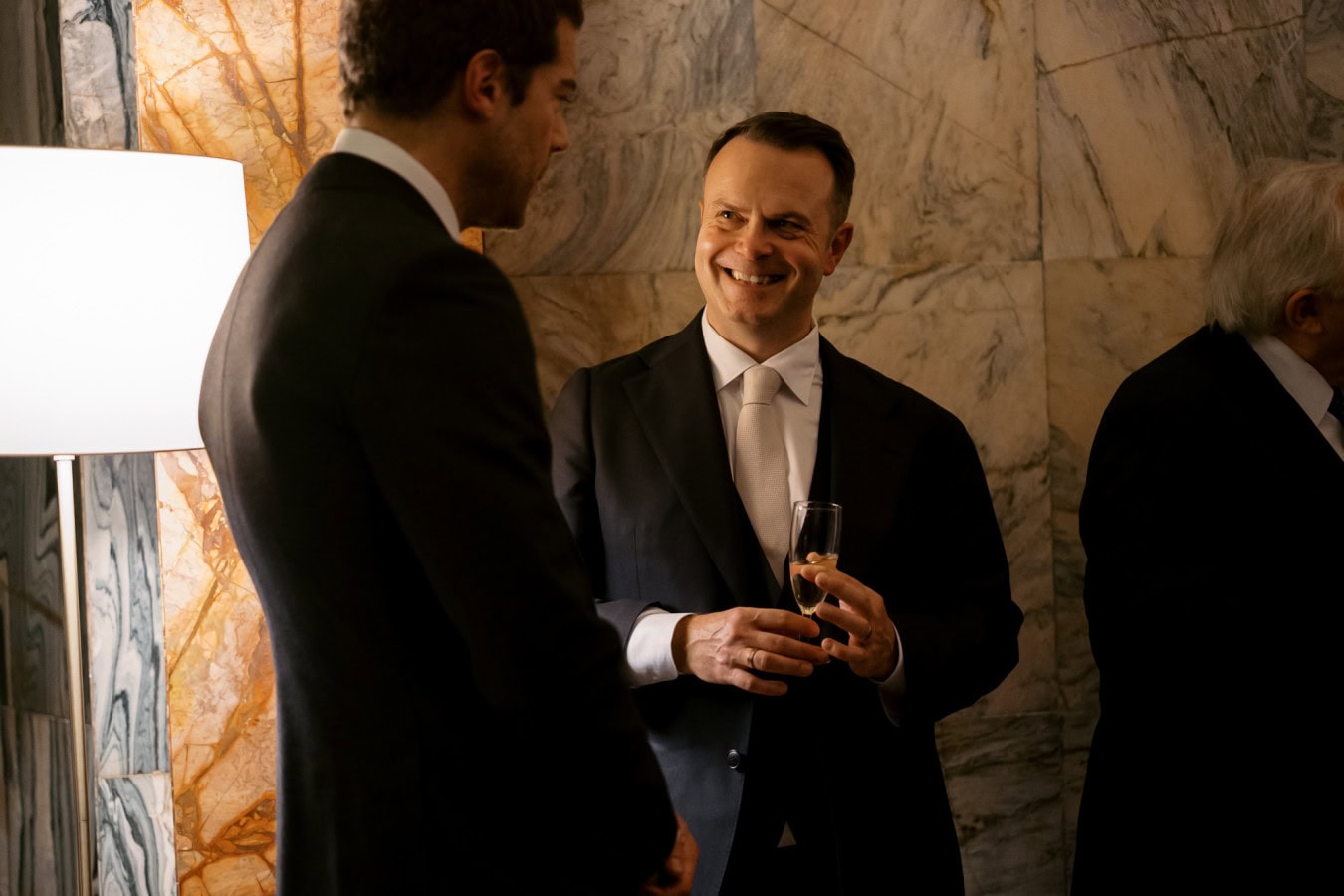 Wedding guest smiling