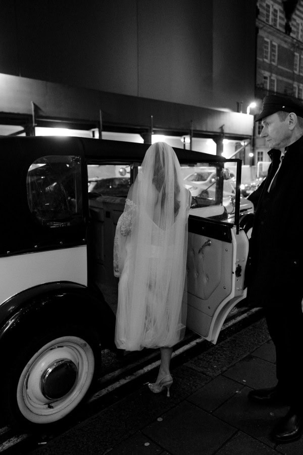 Bridge getting into a London cab