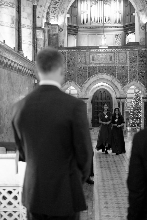 Flower girls walking down the aisle