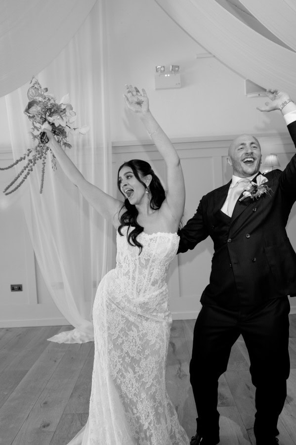 Aarti and Jayke entering their wedding breakfast at Kin House